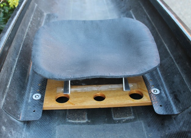 Seat fitted with foam cushioning.
